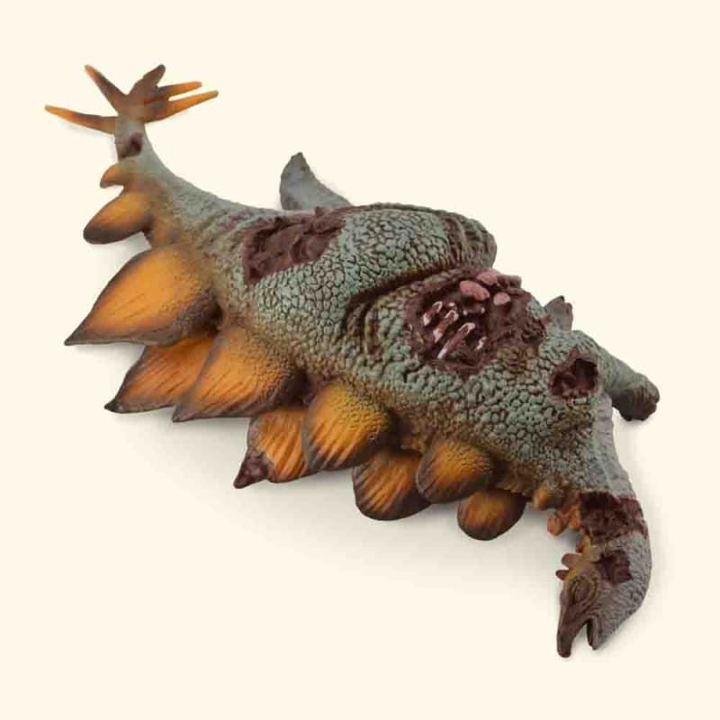 Dinosaurio de juguete Stegosaurus herido - Imagen 1